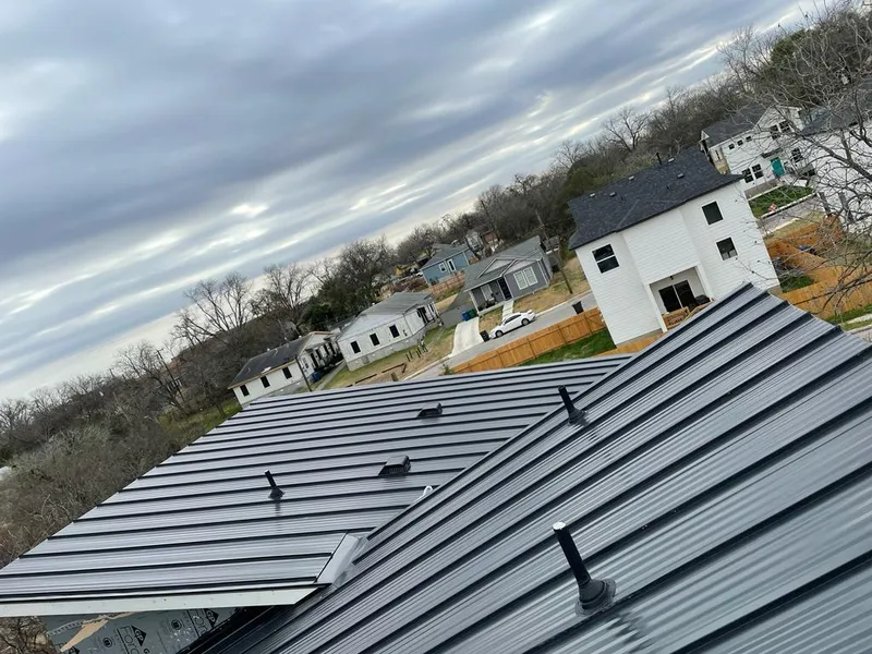Standing seam metal roof panels with vents for Skylight Repair in Lexington